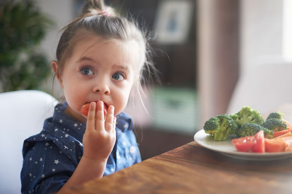Girl eating healthy for good nutrition
